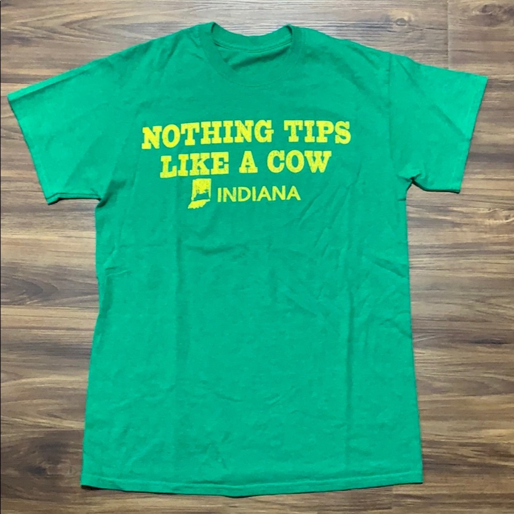 Nothing tips like a cow Indiana shirt green. Small